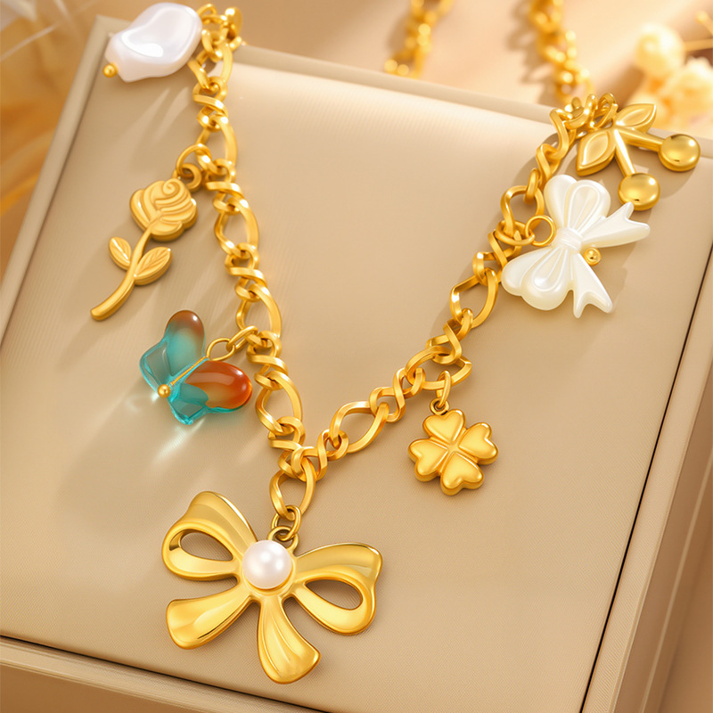Collar colgante de rosa con lazo de acero de titanio nuevo transfronterizo, joyería de collar de perlas de trébol de cuatro hojas para niñas de todo fósforo de moda image 1