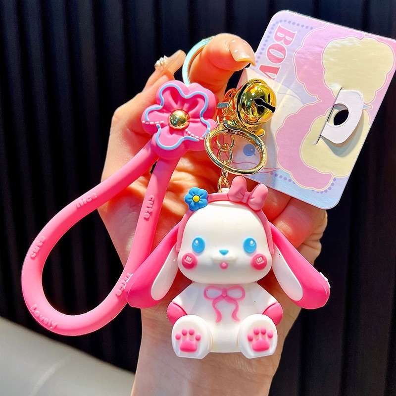 Keychain dinosaurio auténtico lindo bolso colgante de goma blanda llavero de automóvil muñeca pequeña máquina de regalos al por mayor image 10