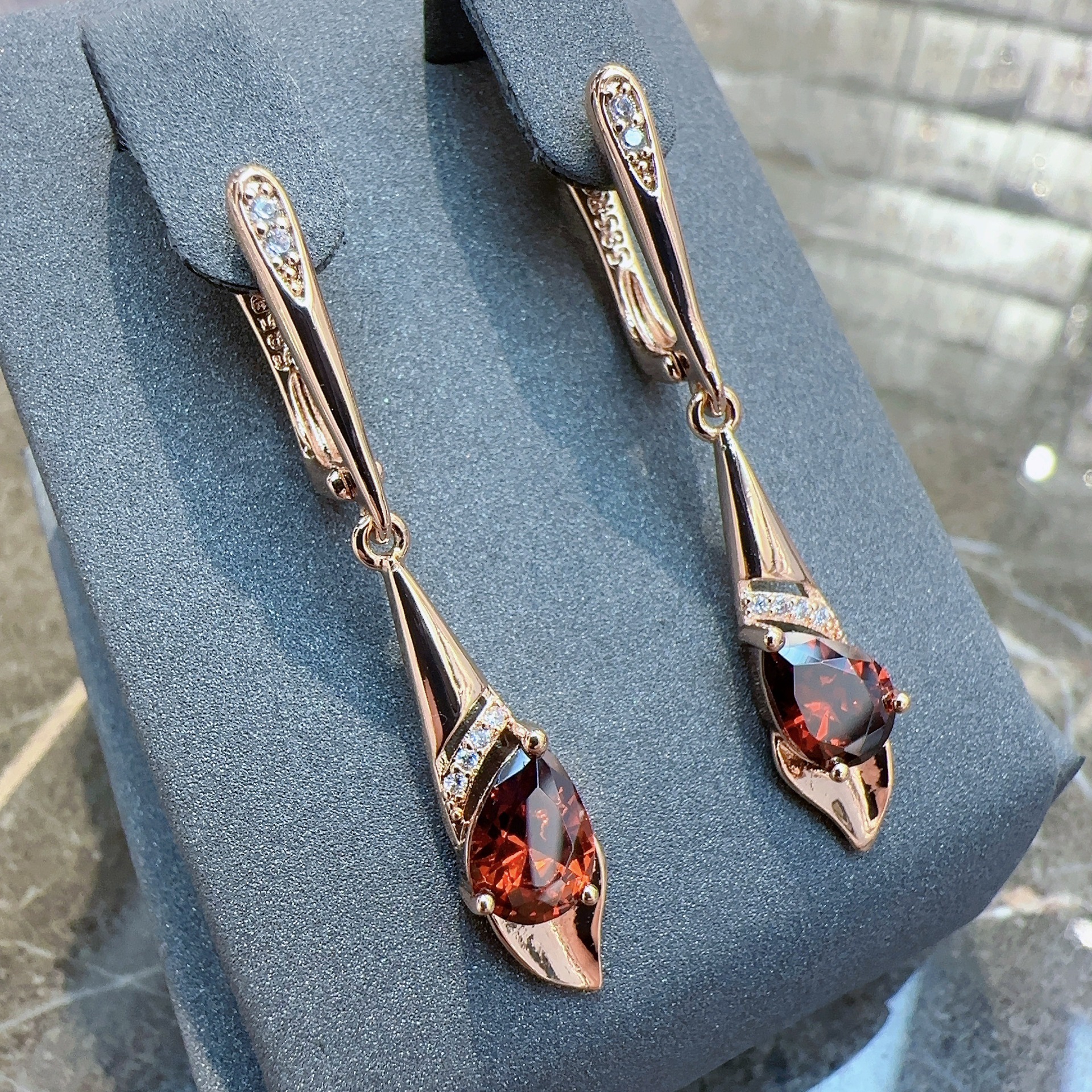 Ruby earrings with zircon