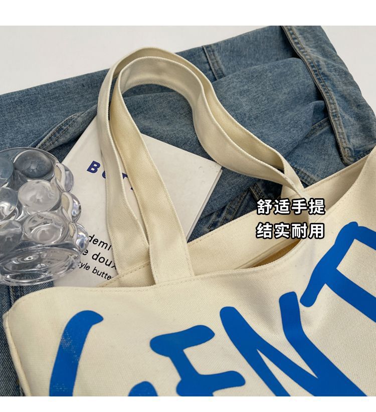 Commuting single-shoulder letter large-capacity versatile bag, canvas bag, Japanese student class artistic bag, women's tote handbag Item Picture