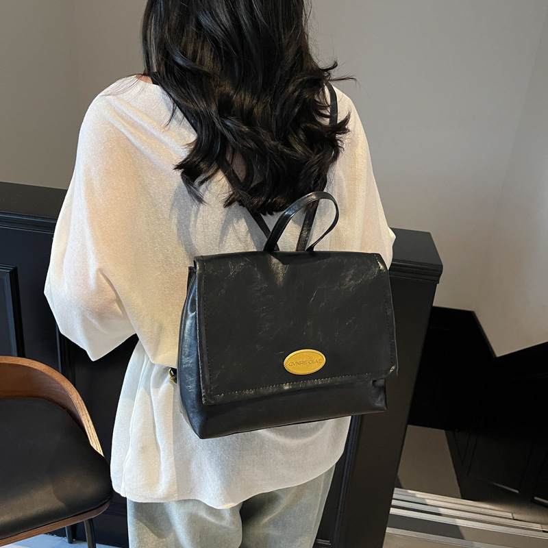 Mochila coreana retro de estilo universitario 2024 invierno nuevo simple de gran capacidad de mano mochila de hombro para viajar