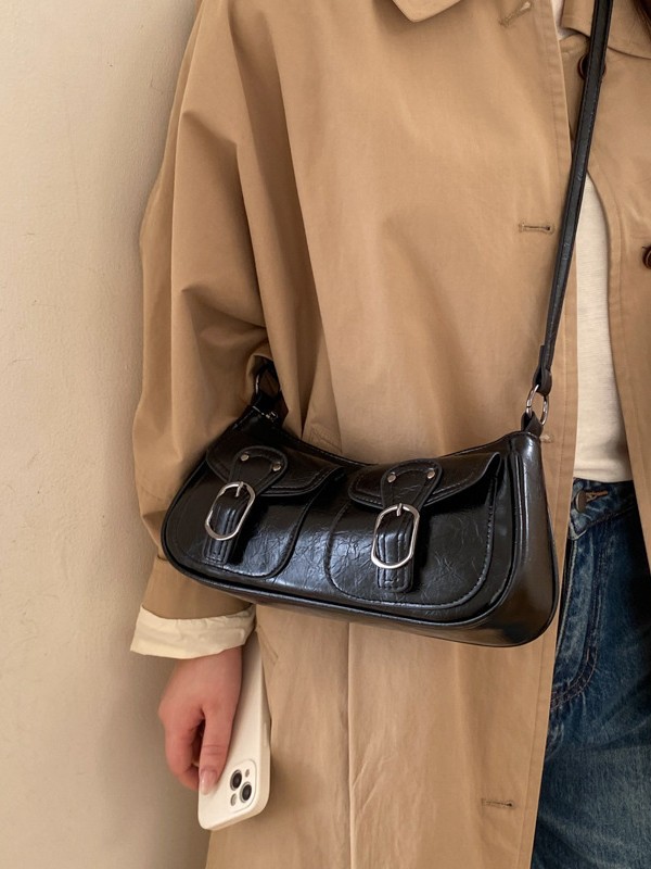 Retro versátil hombro explosivo nicho bolsos debajo de la axila mujeres 2026 ventas calientes nuevas lujosas de moda alta sensación de backpack
