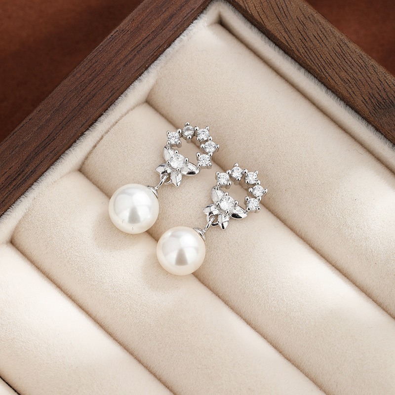 925 plata esterlina temperamento perlas perlas de verano alta sensación de moda flor de piedra arco pendientes para mujeres