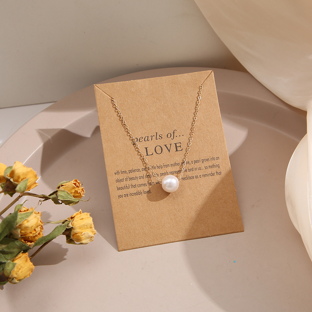 Collana elegante con perle e pendenti animali per donna_voghion.com