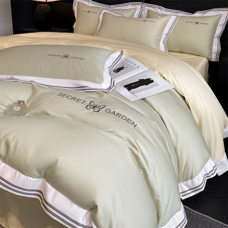 Simple ligero de lujo algodón puro cuatro piezas de sábanas de algodón ropa de cama textil doméstico cuatro estaciones tres piezas de conjunto general