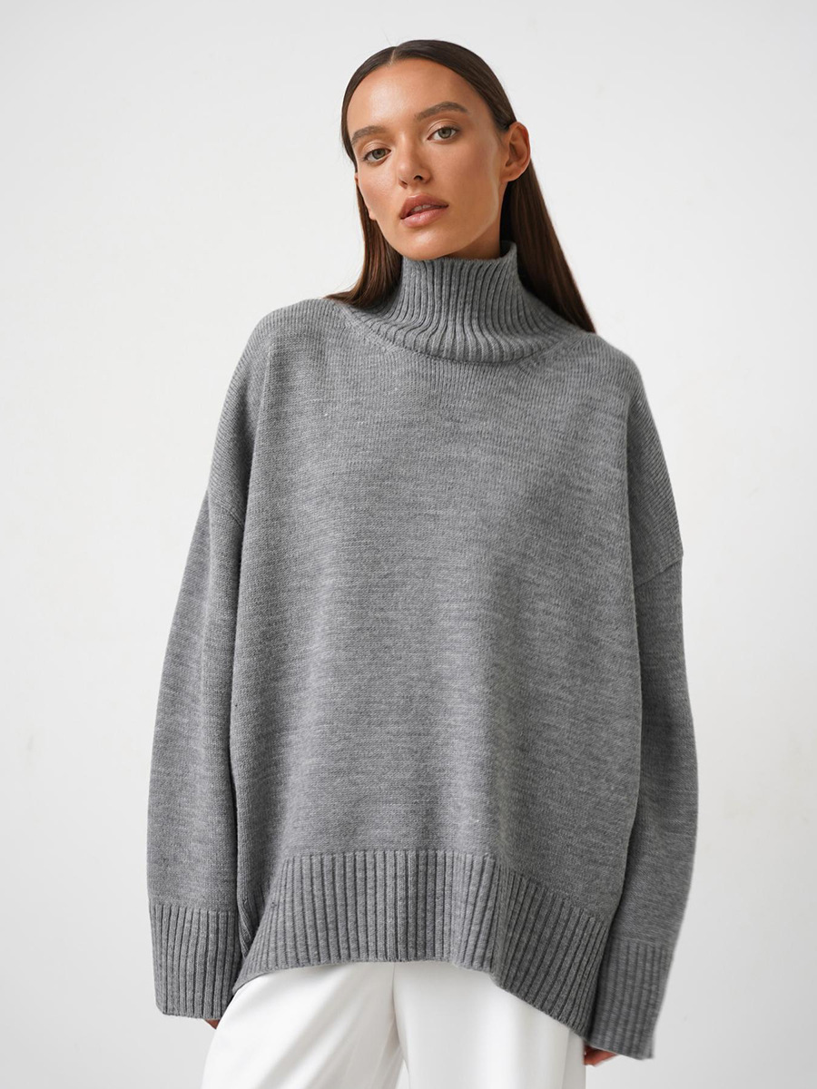 Suéter de cuello alto transfronterizo para mujeres 2025, Europa y los Estados Unidos de otoño y invierno explosivo color sólido jersey de punto de cuello alto suéter suelto para mujeres
