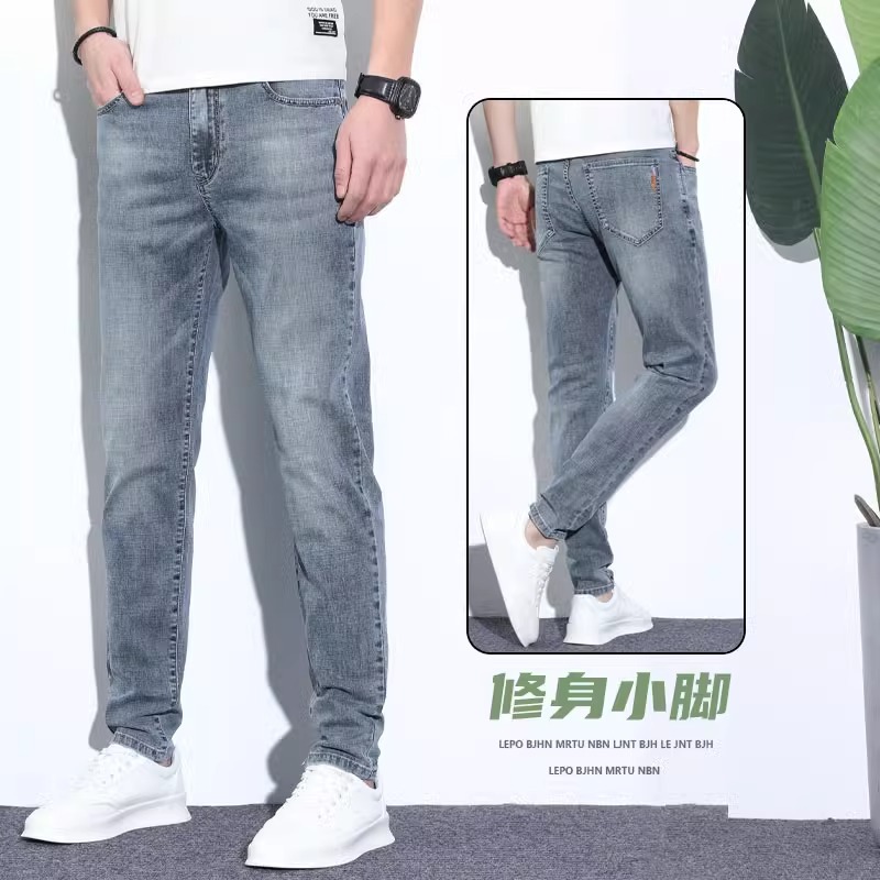 Jeans de primavera para hombres 2025 marca de moda coreana recta delgada pantalones de pie pequeño de verano claro pantalones elásticos para hombres