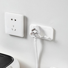 Japanese Multi-Functional Creative Plug Hook — Kitchen Wall-Mounted, Strong Adhesive, No-Drill Power Cord & Outlet Storage Rack