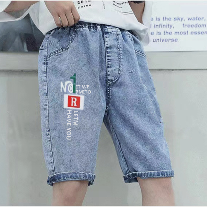 男の子のデニムの7分のズボンの夏の薄いタイプの子供の半ズボンの子供の中でズボンの中で大きい子供の男の子のズボンのファッションは代行します。|undefined
