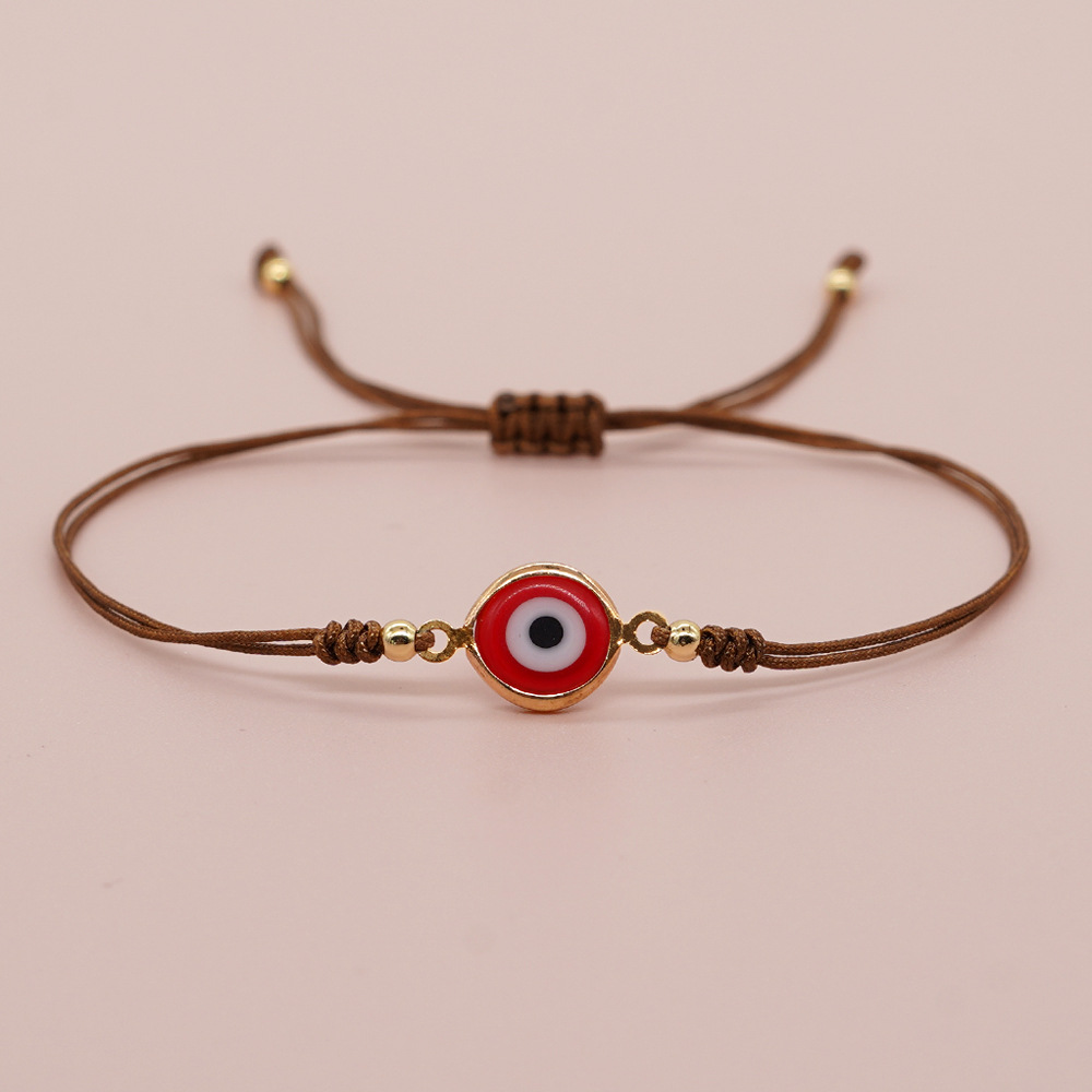 Pulseira de berloques olho grego com contas douradas_voghion.com