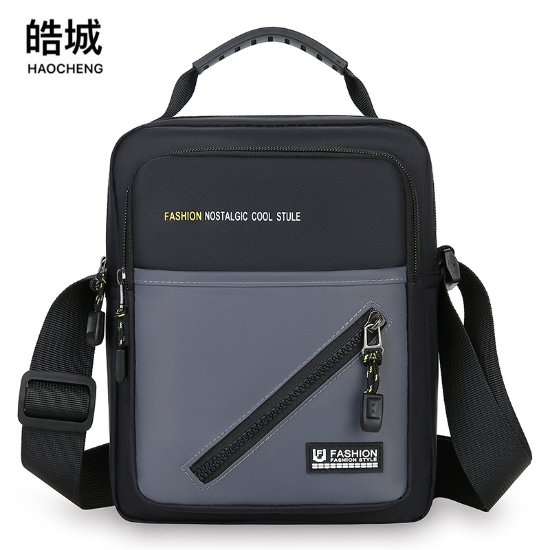 Bolso de hombro para hombre de nuevo estilo bolso de tela Oxford ligero bolso de viaje deportivo de ocio simple y versátil bolso de mensajero de moda marea