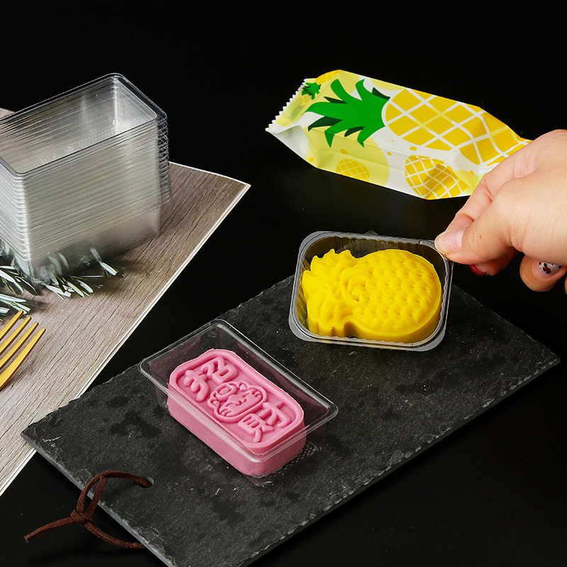 En stock al por mayor transparente simple entrega crujiente caja de soporte de plástico blister material PET engrosada postre piña crujiente soporte interior