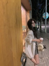 白色不规则长袖衬衫2025春夏新款宽松百搭中长款翻领白色衬衣女装