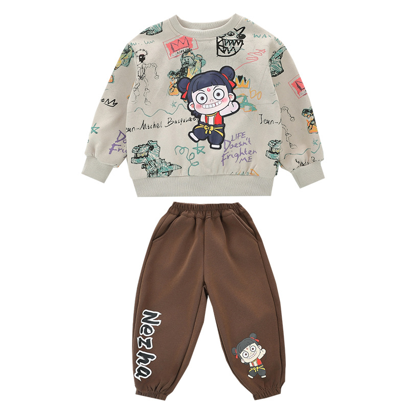 7779 Traje de dibujos animados de graffiti para niños 2025 Nuevo estilo Niños pequeños y medianos Cuello redondo Traje de dos piezas Bebé Ropa casual para niños