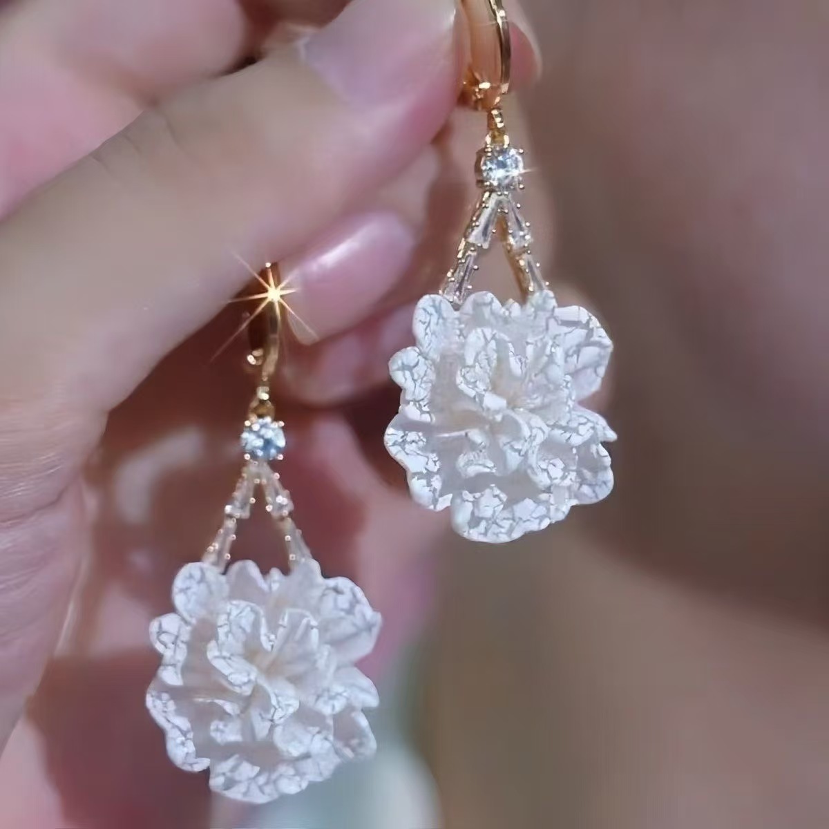 White earrings, flowered