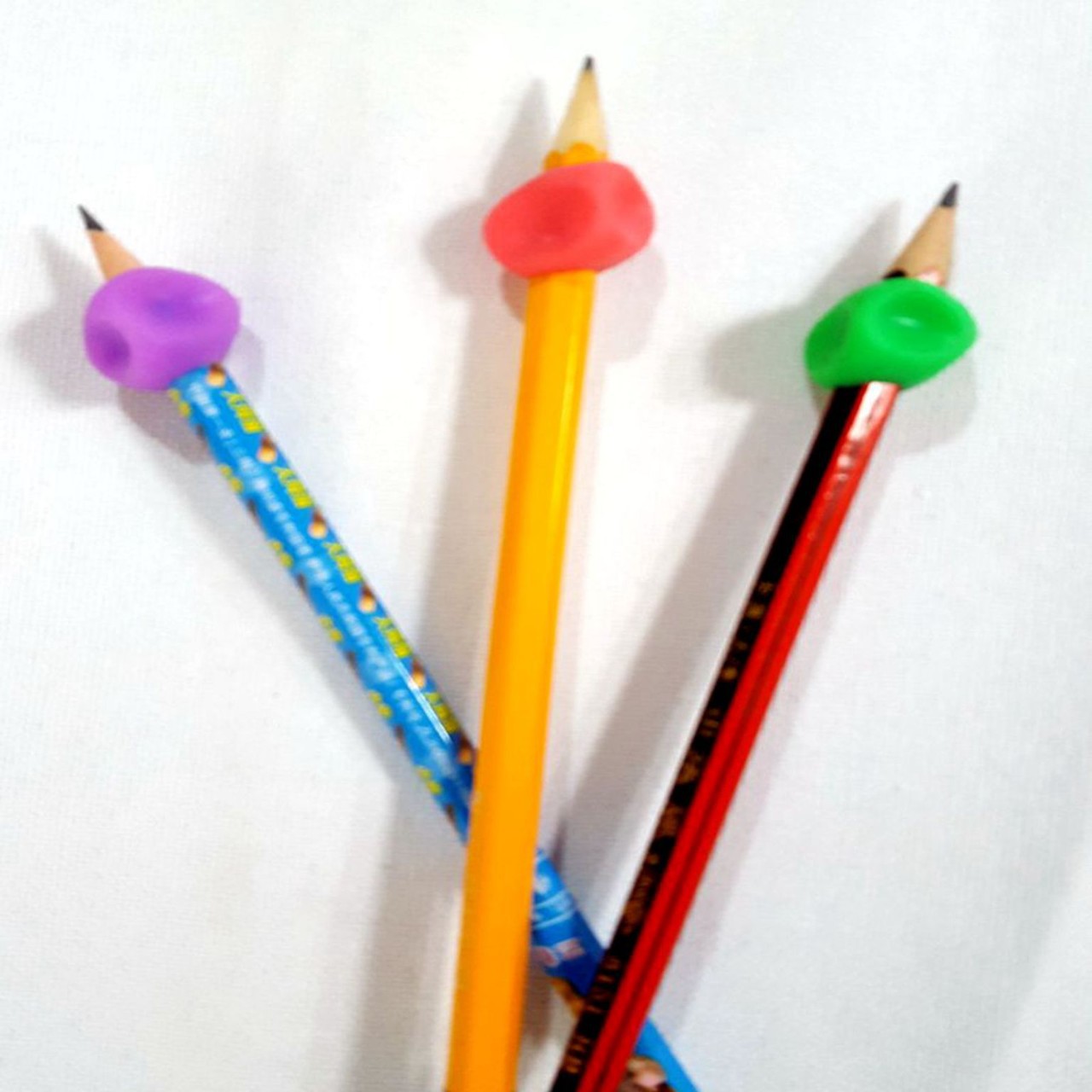 Productos de Venta caliente, estuche de lápices de silicona, corrector de sujeción de bolígrafo, buen efecto de escritura para niños pequeños y estudiantes de primaria