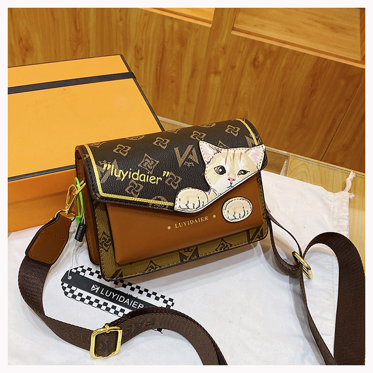 Bolso bandolera para mujer 2024, nuevo y moderno bolso bandolera con correa ancha y diseño de gato de dibujos animados, bolso de moda de alta gama para mujer._voghion.com