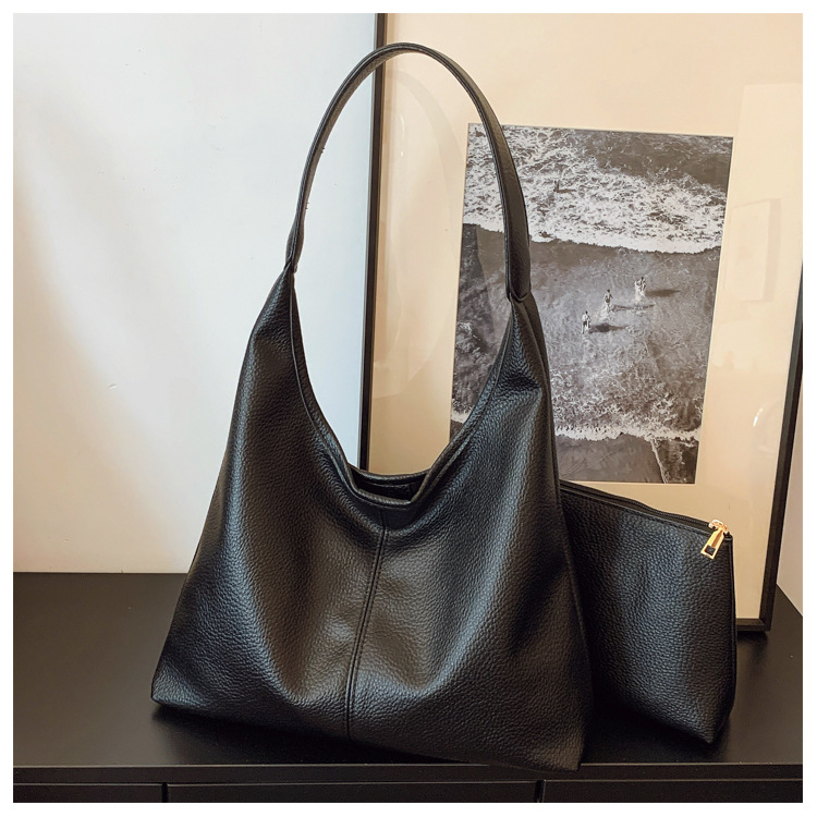 Bolso de cubo portátil de sentido avanzado transfronterizo Bolso de hombro de moda de todo fósforo retro femenino Bolso de viaje de gran capacidad casual