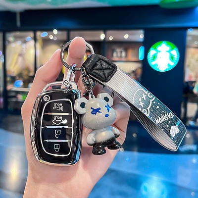Cross-border hot sale suitable for silver edge modern 4 key key cover for foreign trade South Korea modern car interior protective shell (Car key bag) - modern-q-model-smart-4-button-speaker-single-shell-black-gray-violent-bear-pendant