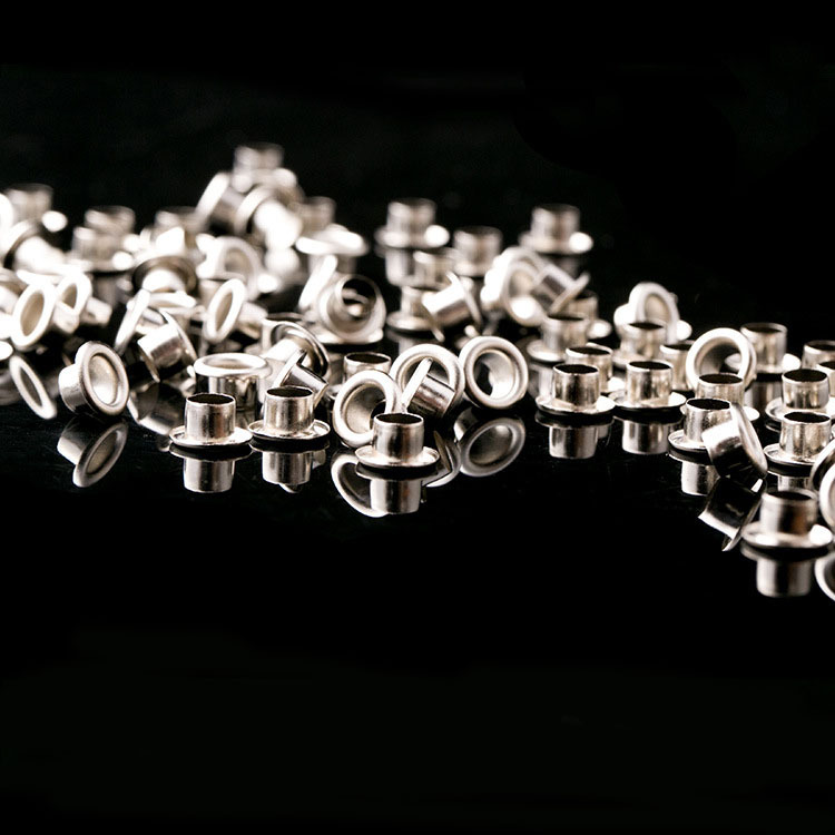 Hebilla de fijación ojo remache agujero de aire clavo cordón hebilla publicidad hebilla etiqueta anillo hebilla agujero de aire hebilla de hierro hebilla de ojal antioxidante