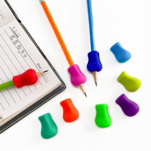 Cross-border silicone pencil holder kindergarten pencil practice writing pen holding posture corrector wholesale children's corrector
