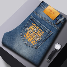 广州新塘牛仔裤男 高端欧货修身小脚跨境外贸欧美刺绣小怪兽裤子