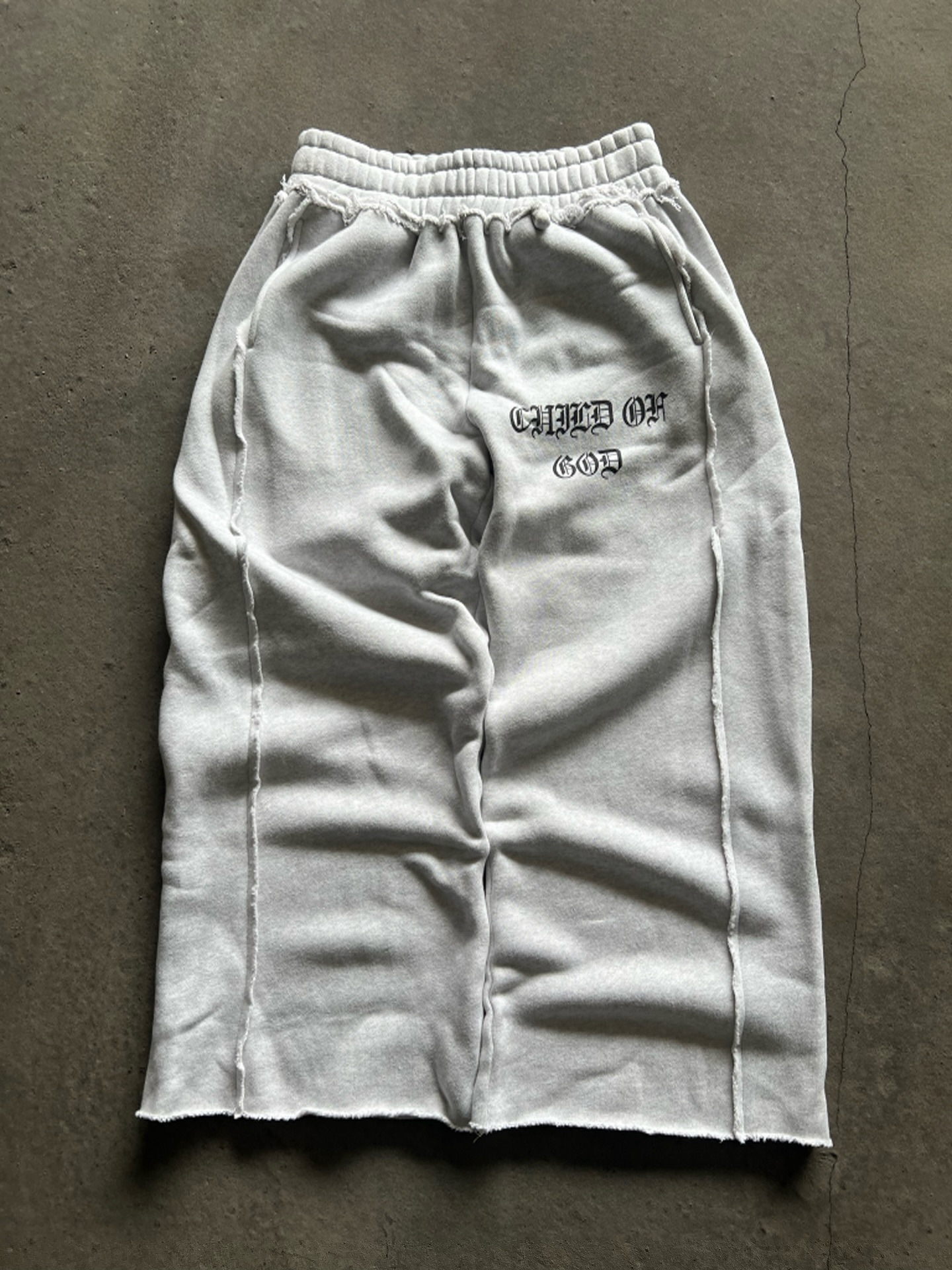 Otoño y invierno nuevo estilo europeo y americano al por mayor de moda nicho de diseño de calle personalidad impresa suelta pantalones elásticos al por mayor