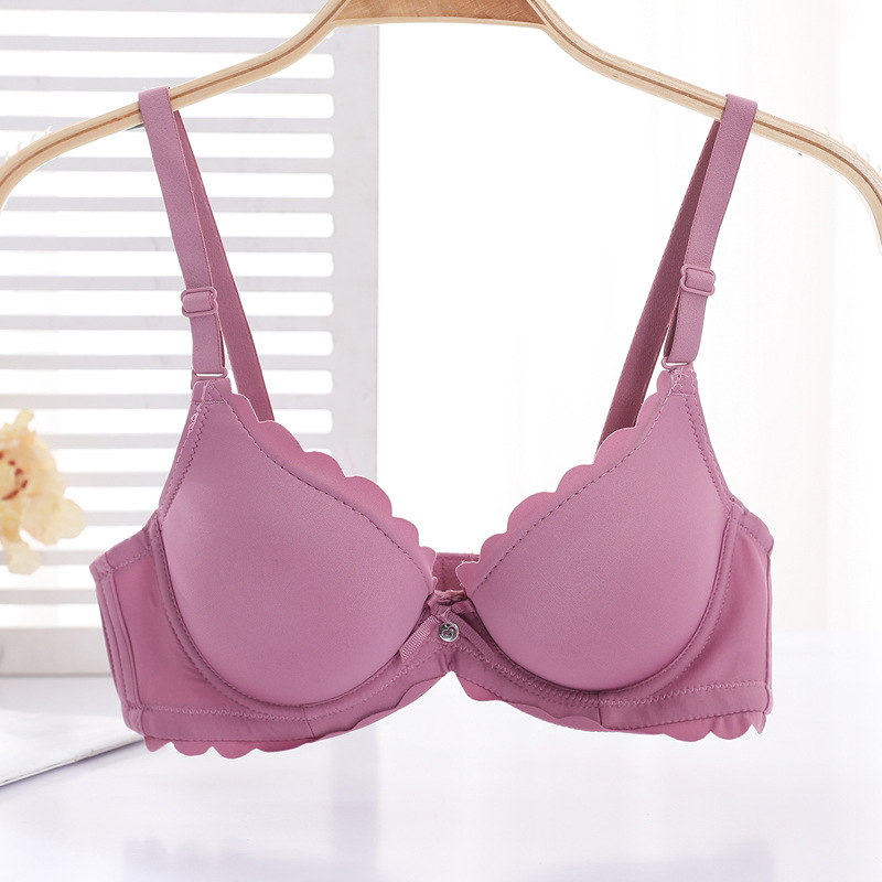 Fábrica de sujetadores de Shantou en stock brillante sin marcas de grosor pequeño sujetador de ropa interior para mujeres ajustable soporte superior para evitar caída