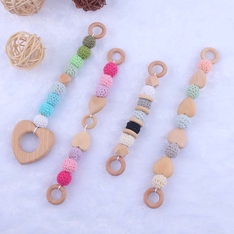 Nueva historieta del bebé haya amor mordedor juguete DIY macaron gran bola de lana mordedura pulsera