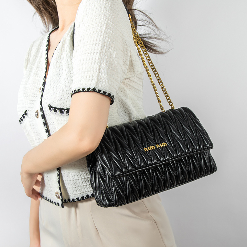 Bolso de cadena de nicho francés bolso de axila femenino 2024 nuevo bolso de moda plisado bolso de cuero genuino