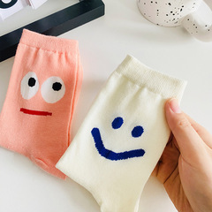 Fall-season mid-calf cartoon smiley-face trendy socks for women — featuring large-eye designs, these sweet and versatile long socks are made from pure cotton.