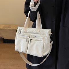 大容量の女性カバンの新型韓国版シンプルな女性のシングルショルダーバッグ