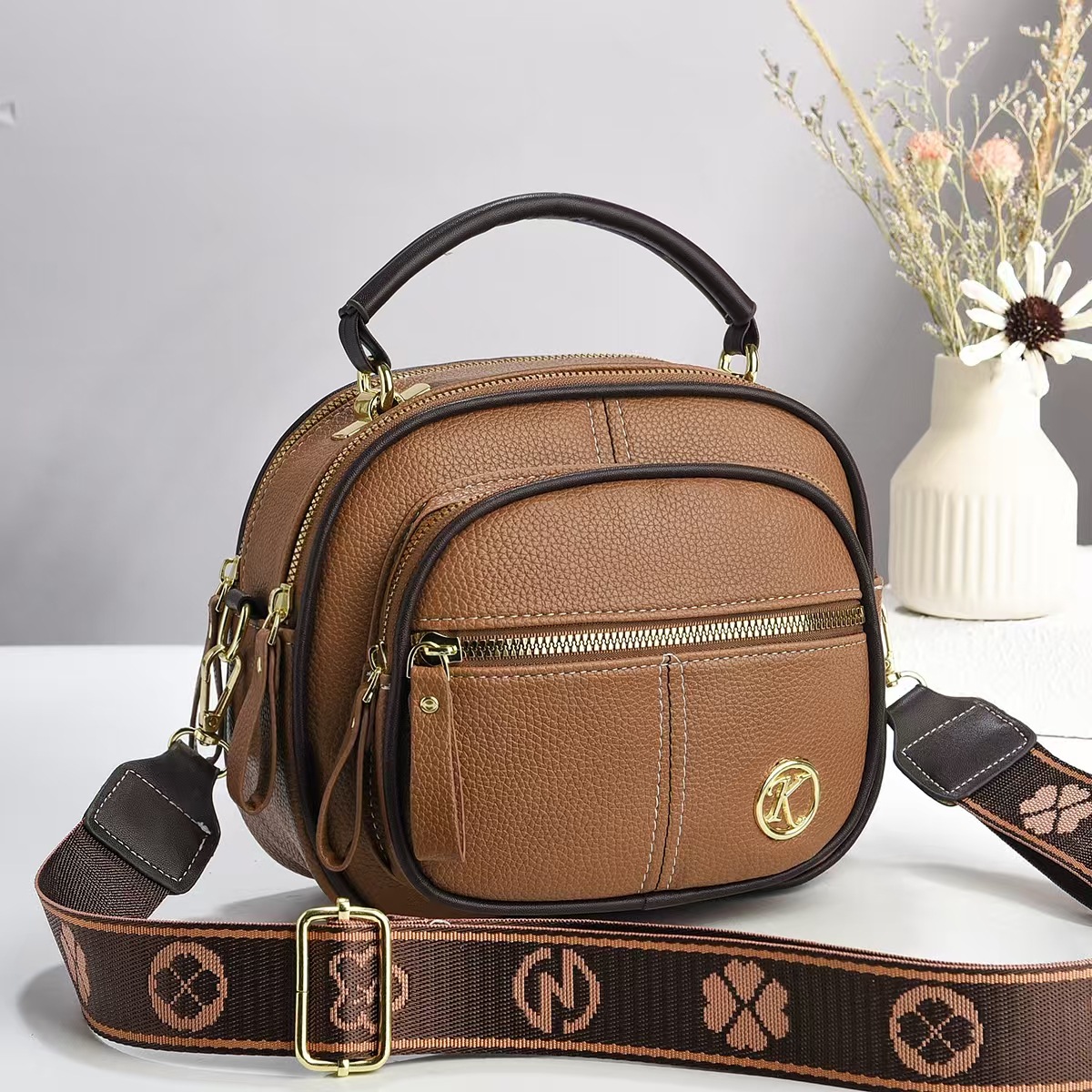Exquisita mini bolso de verano 2025, nuevo bolso redondo, bolso de hombro casual versátil, bolsos de mano
