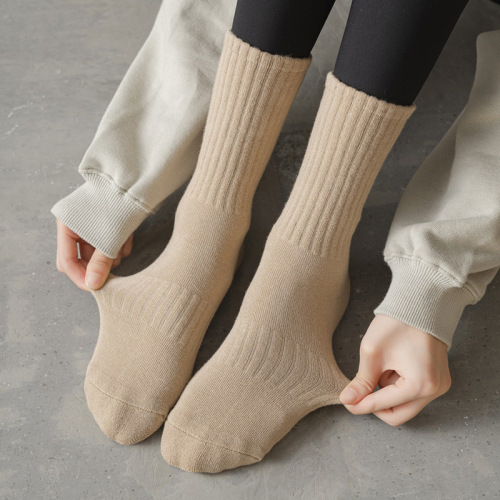 Socks for men and women in autumn and winter solid color thickened warm terry socks towel bottom long socks wholesale