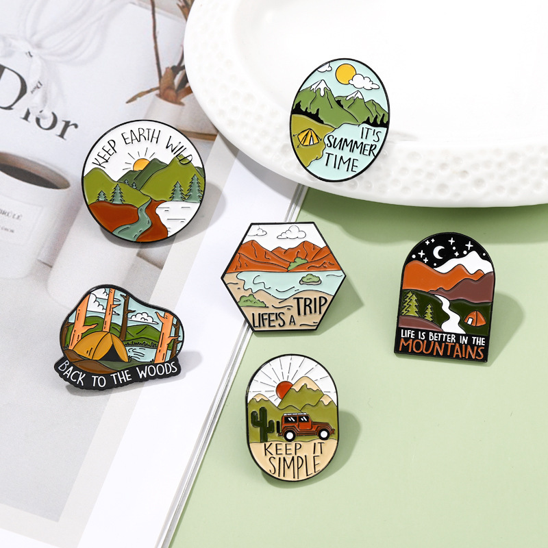 travel metal brooch