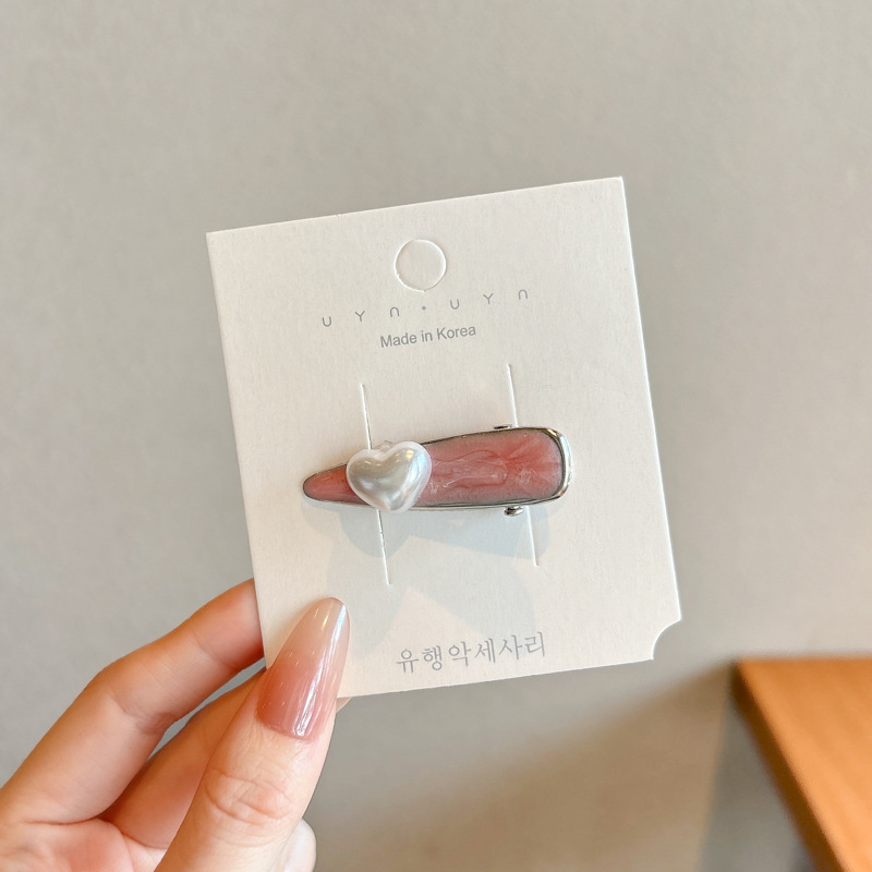 Coreana lateral frange clip de cabello de la frente de mujer sensación avanzada 2025 nuevo toque de dopamina clip de boca de pato