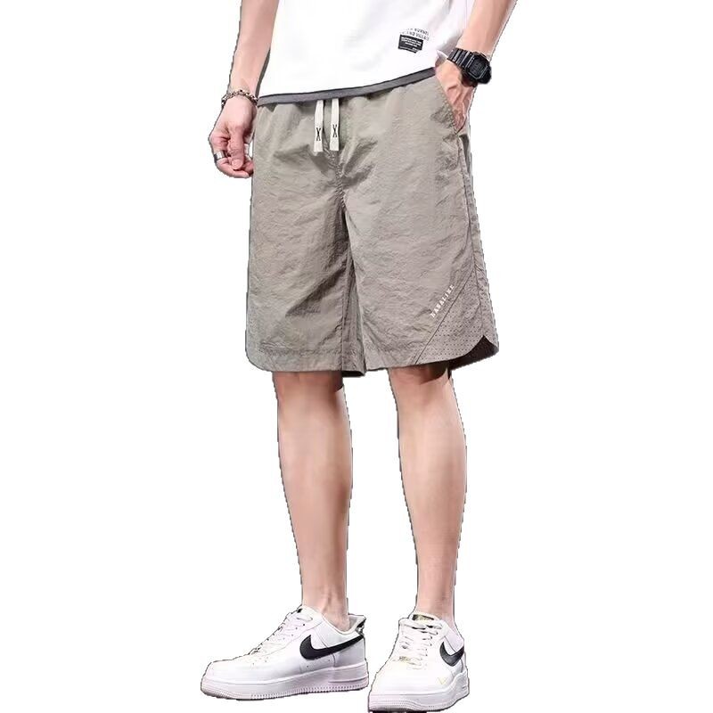 Camisas, menos ropa, pantalones de verano de cinco puntos, holgados y cómodos, todo-fósforo, pantalones casuales de estilo de Hong Kong, deportes para hombres, hombres estadounidenses, de secado rápido