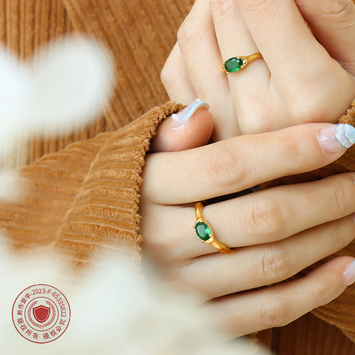 Korean Instagram-style brass material ring, embedded with emerald oval zirconia, unique personalized design, couple's matching rings
