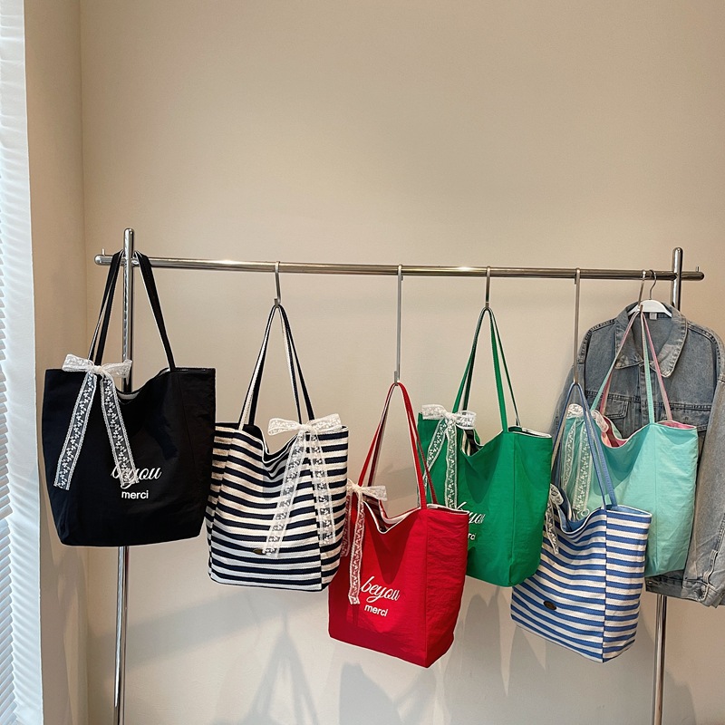 Nueva bolsa de hombro a doble rayas, bolsa de gran capacidad, bolsa de lona casual simple, bolsa de compras universal