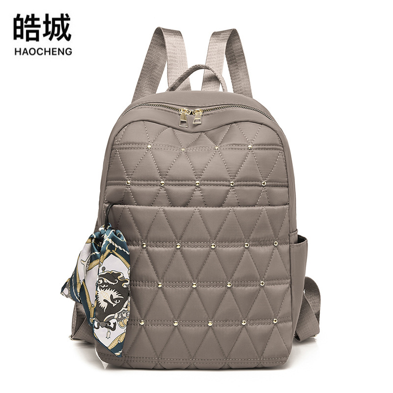 Bolsos para mujer 2022 nueva mochila Oxford casual para mujer, remaches de moda, mochila para estudiantes de secundaria de gran capacidad, mochila escolar