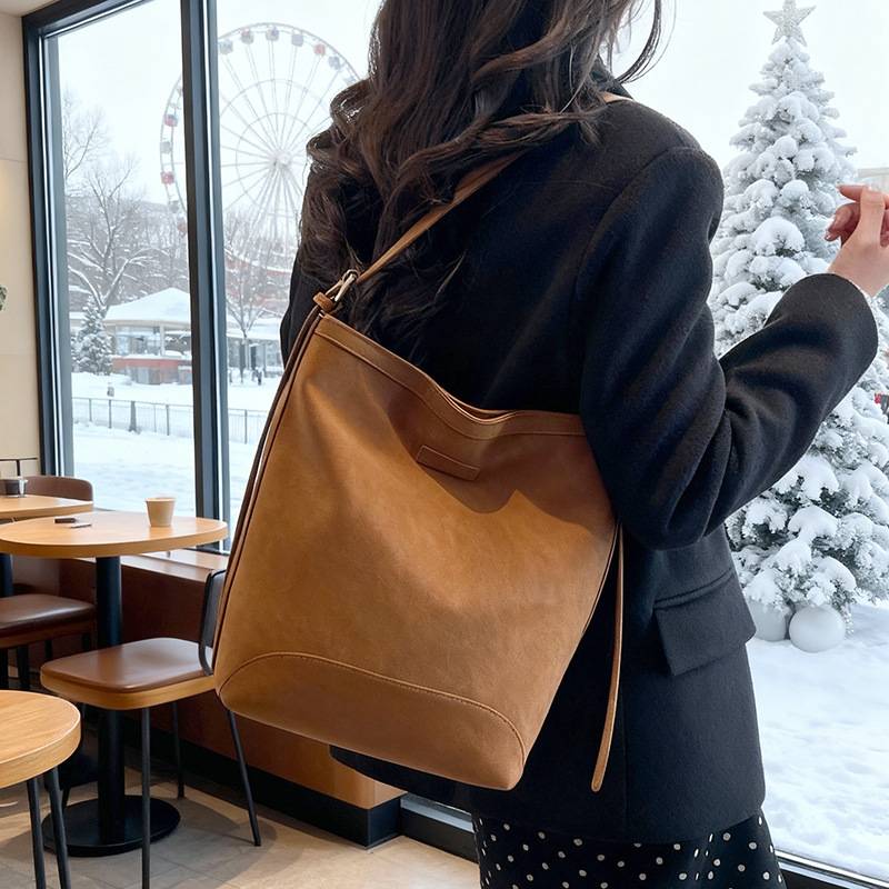 2025 nuevo bolso de brazo de viaje universal bolso de viaje de viaje de mujer simple retro mochila de hombro bolso de cubo