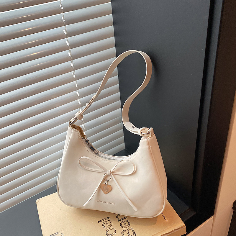 Borsa a tracolla da donna con fiocco per il pendolarismo_voghion.com