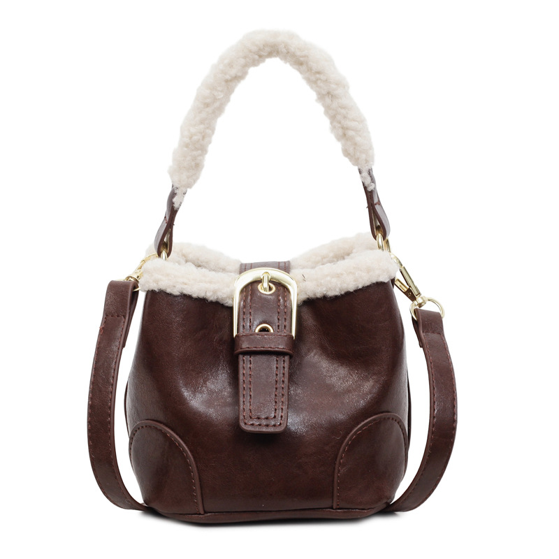 Cordero MINI bolso de cubo de mano retro bolso de peluche de color para mujeres 2025 invierno nuevo mochila de hombro