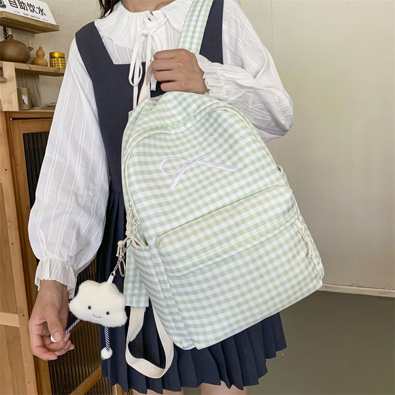 Mochila escolar de gran capacidad para estudiantes de secundaria, mochila de nailon ligera para mujer 2024 nueva moda pequeña mochila de viaje fresca