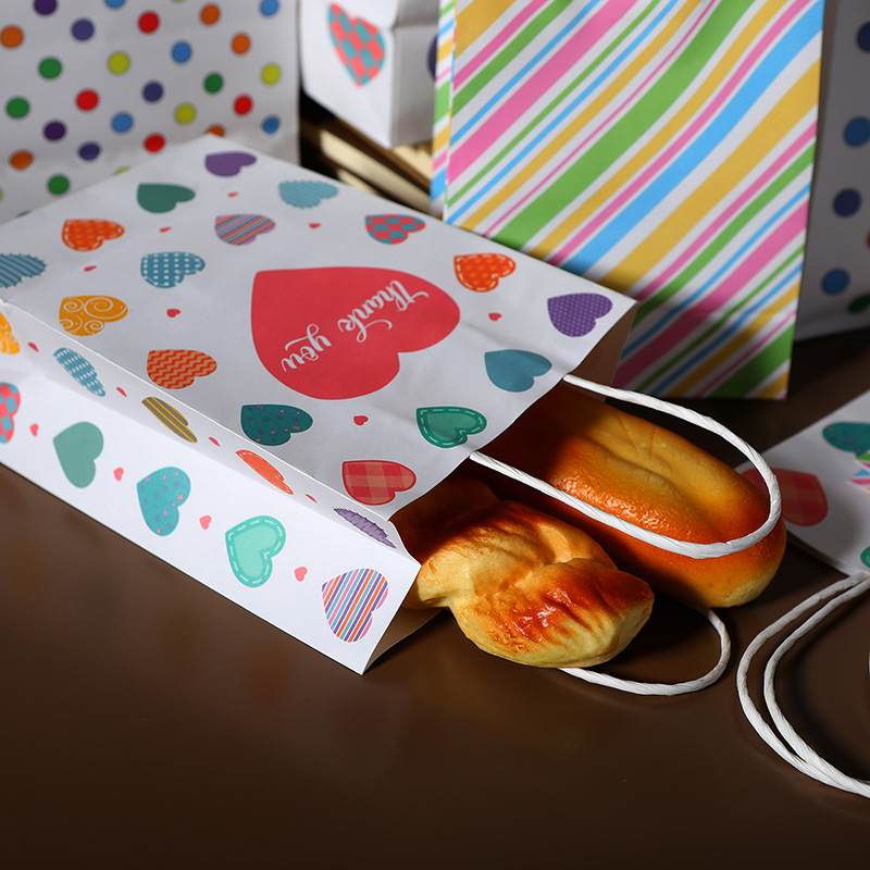 现货印花牛皮纸手提袋 节日通用礼物袋 烘焙奶茶包装纸袋礼品袋批