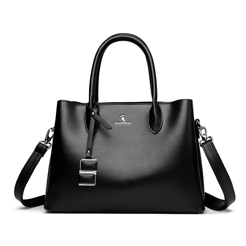 Nuevo bolso de mujer simple de moda, bolso de mano de cuero suave de gran capacidad, bolso de tela de mujer, bolso de canguro