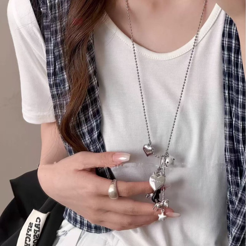 Blogger's Same Heart Puppy Necklace, Niche Design, Versatile Leather Rope, Tassel Long Necklace, Versatile and Fashionable