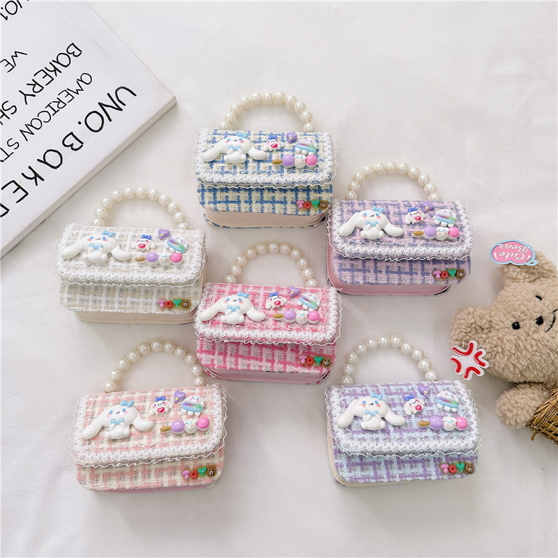 Otoño e Invierno nueva niña monedero dibujos animados lindo accesorios perla bolso versátil estilo occidental bebé bolsa de hombro