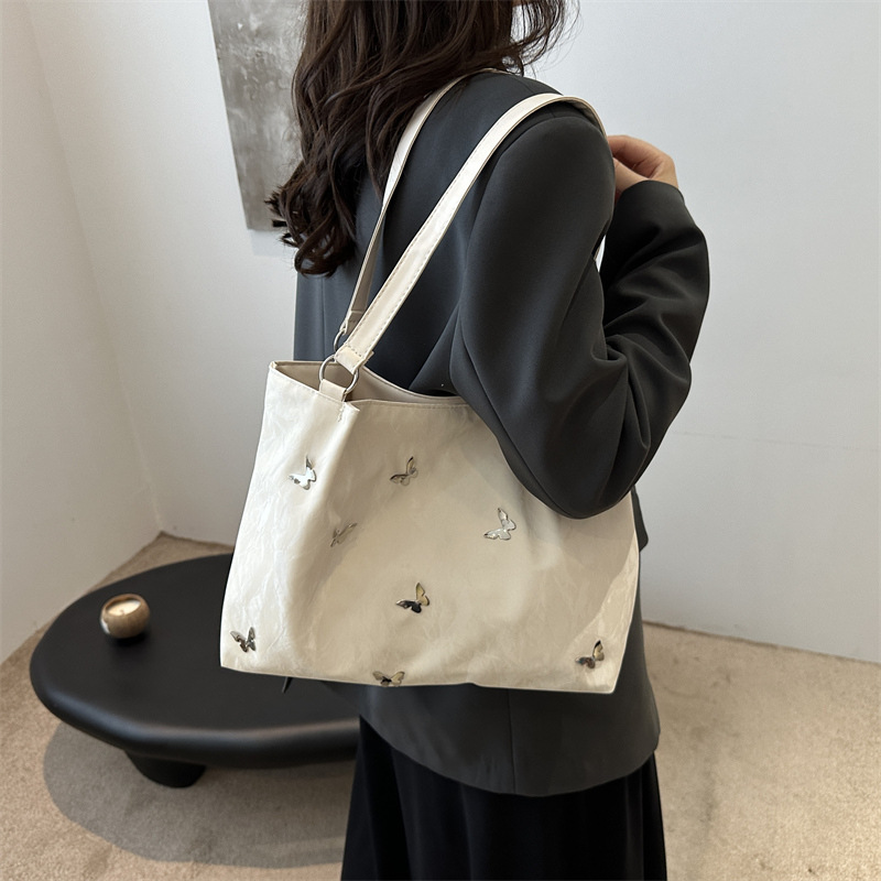 Bolsas de viaje de gran capacidad 2025, nuevas bolsas de mujer casuales, bolsas de arco de hombro para estudiantes universitarios, bolsas de clase.