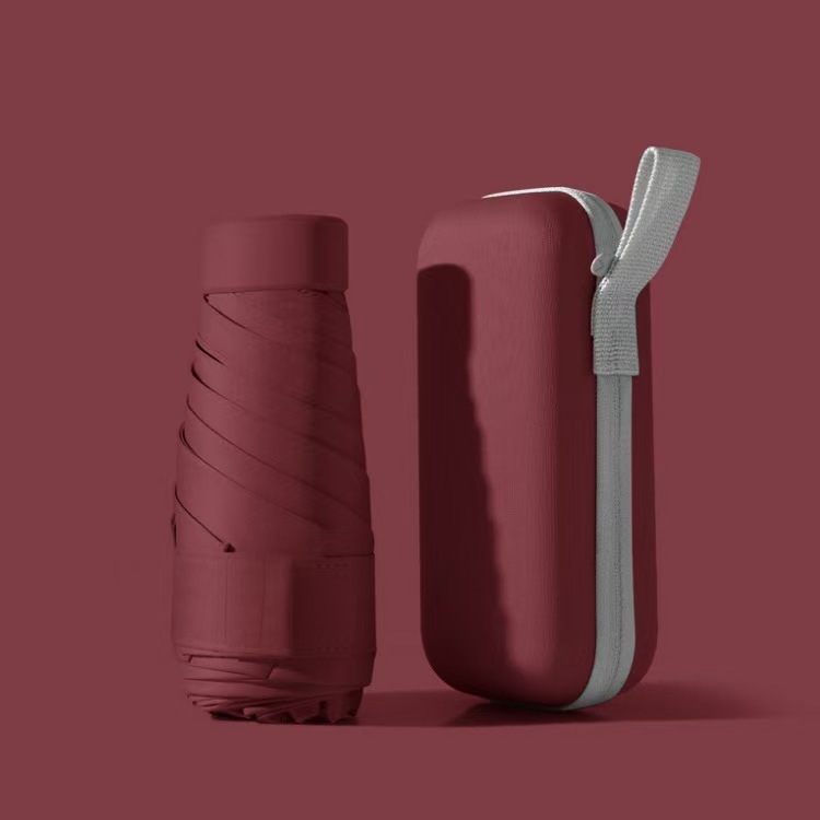 Capsule paraguas para mujeres sol y lluvia doble protección solar UV pequeño portable plegable mini paraguas al por mayor